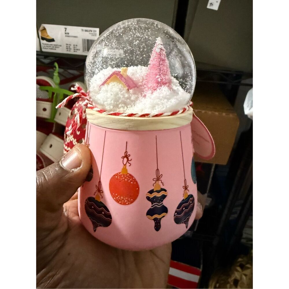 The 2023 Huntington Home Snow Globe Candle in Bergamot & Mahogany. - Picture 4 of 4